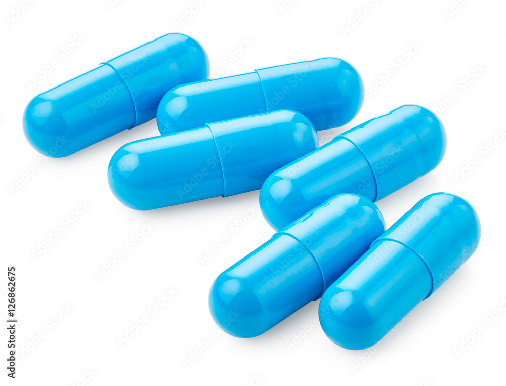 Blue pills isolated on white background Blue pills isolated on white background