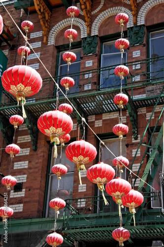 Photography Chinese festival lanterns hanging from building in San Francisco's Chinatown