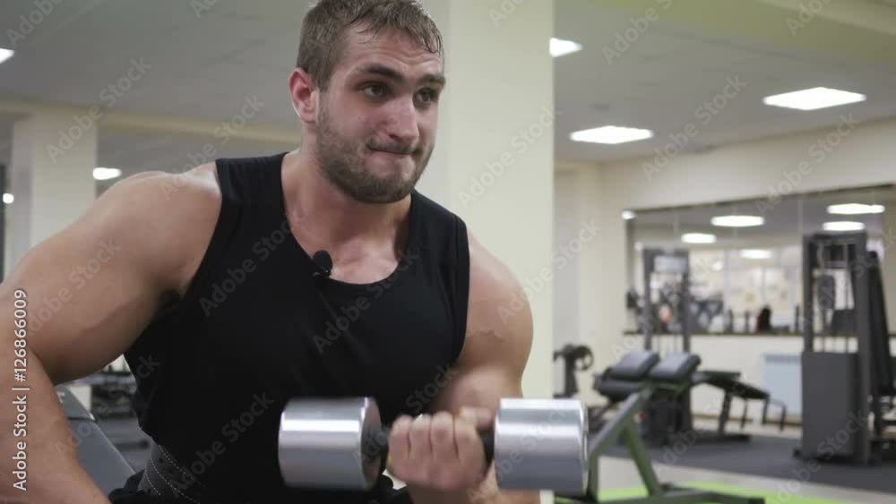 Male bodybuilder training hands. Preparing for the competition. Healthy lifestyle Male bodybuilder training hands. Preparing for the competition. Healthy lifestyle