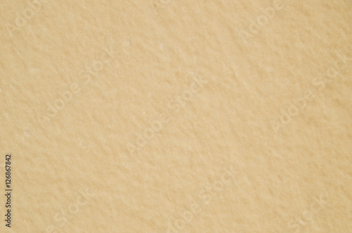 gleaming beige wall background light
