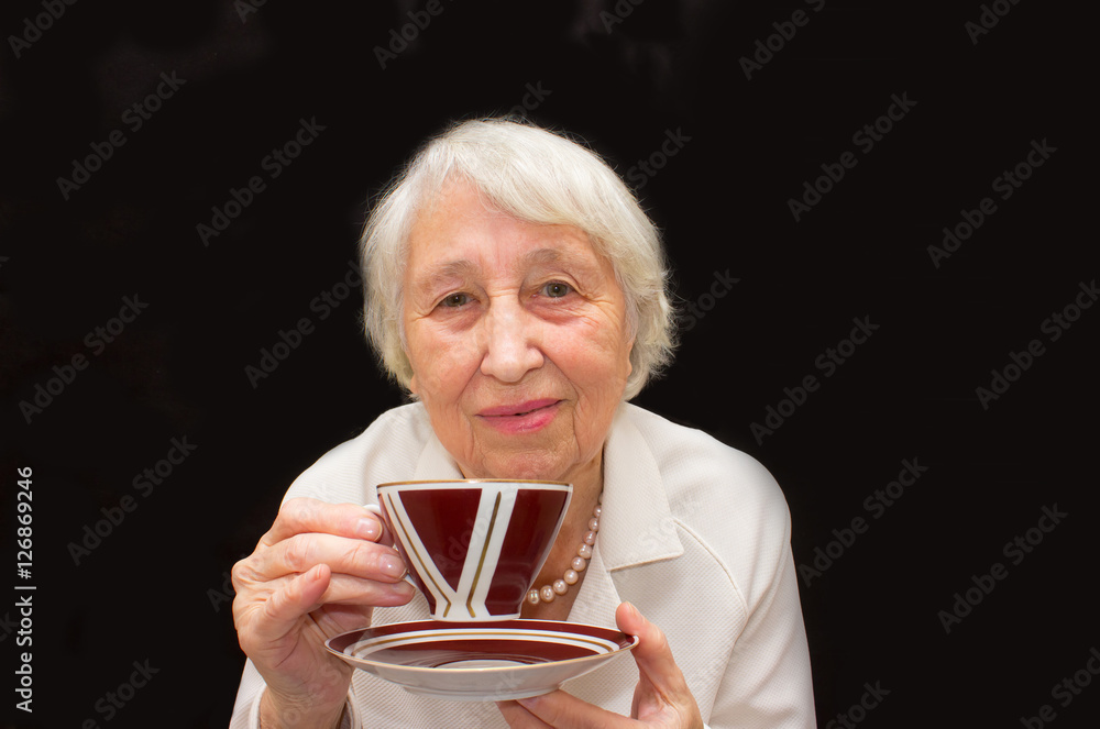 Senior Woman Enjoying Cup Of Tea Senior Woman Enjoying Cup Of Tea