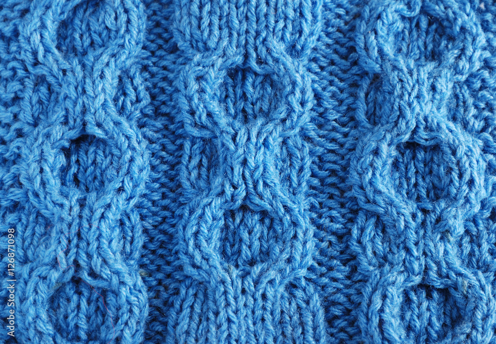 Close-up of knitted cloth with raised tracery Close-up of knitted cloth with raised tracery