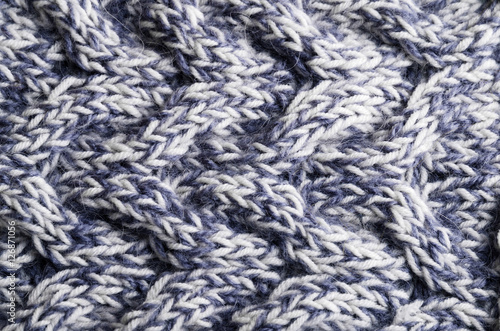Close-up of knitted cloth with raised tracery