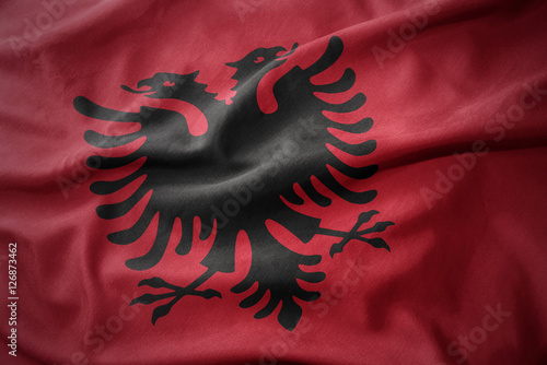 Photography waving colorful flag of albania