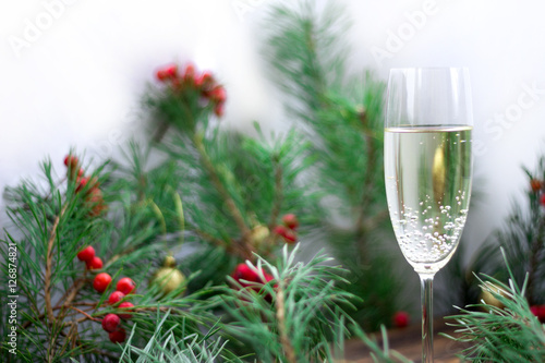 Christmas still life, champaign, pine branches, red rowan, golde © Vera Verano