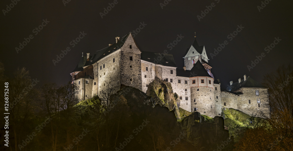 Loket castle in dark night