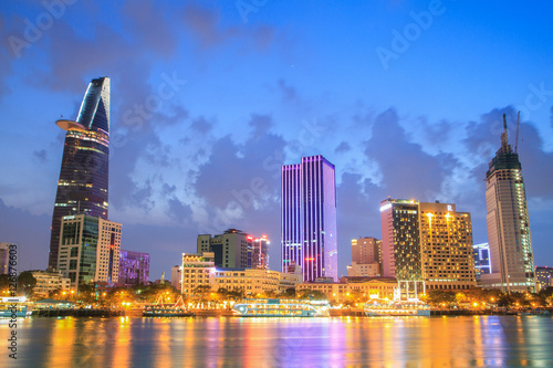 Night view of Downtown center of Ho Chi Minh city on Saigon riverbank in twilight, Vietnam.
 photo