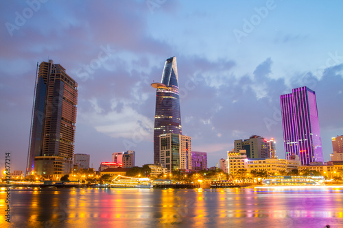 Night view of Downtown center of Ho Chi Minh city on Saigon riverbank in twilight, Vietnam.
