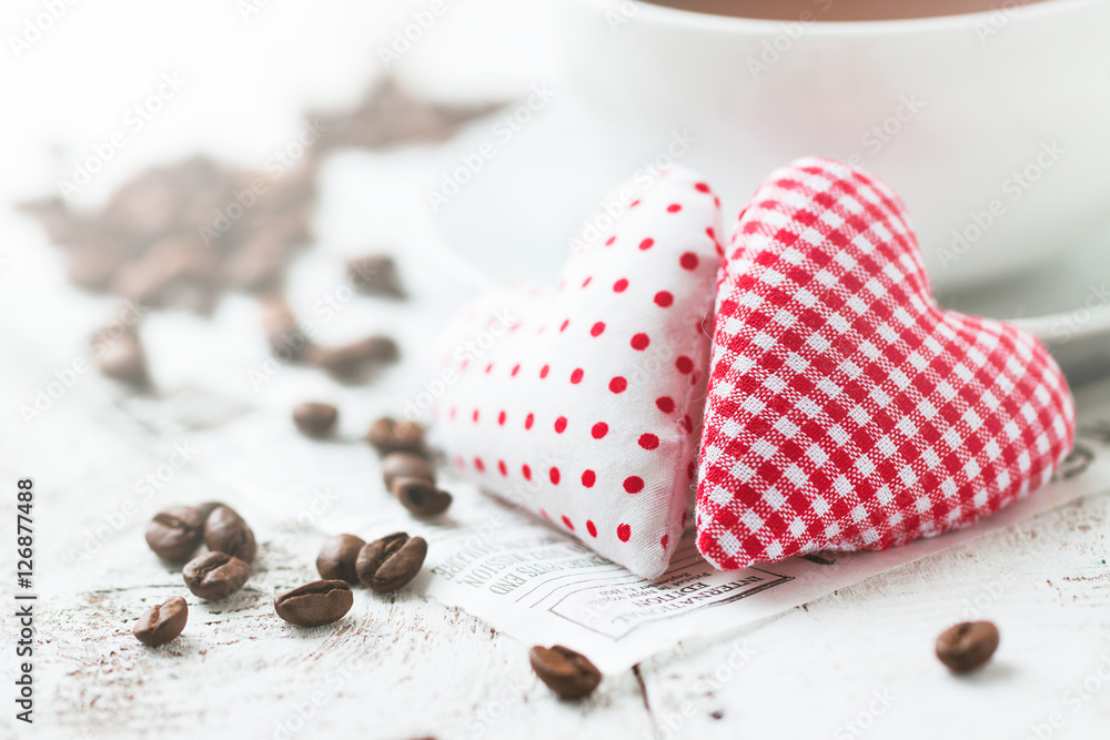 Red plush heart on a wooden background with a cup on a background, horizontal with copy space Red plush heart on a wooden background with a cup on a background, horizontal with copy space