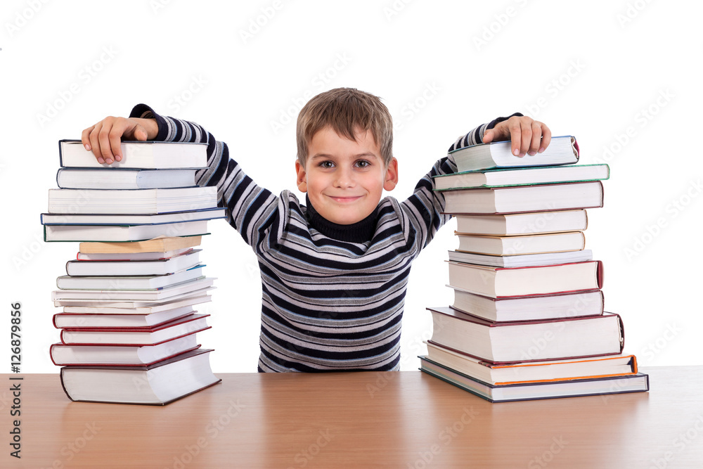 Schoolboy and a heap of books Schoolboy and a heap of books