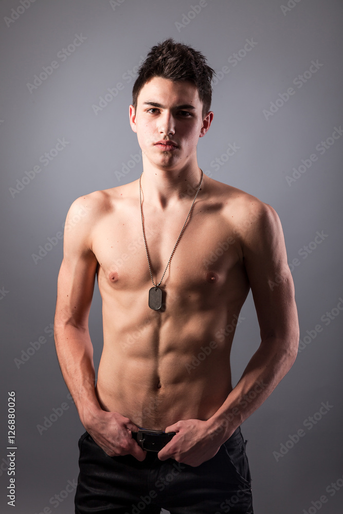 Fototapeta premium Portrait of young bodybuilder man