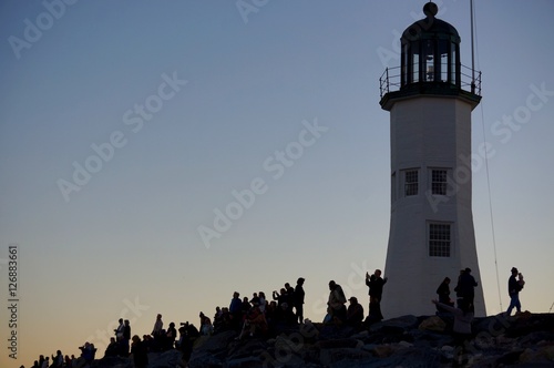 Photographers taking photos of the super moon at Scituate Lighthouse