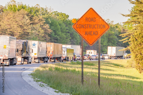 Road construction ahead roadsign.
