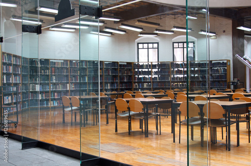 modern library: empty reading room with tables