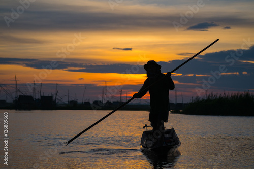 The fishermen go out early for fish. Fishermen in Inle lakes sunset, Myanmar. 