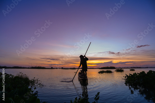 The fishermen go out early for fish. Fishermen in Inle lakes sunset, Myanmar.  © ell