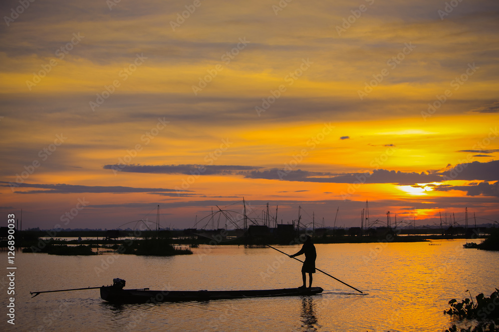 The fishermen go out early for fish. Fishermen in Inle lakes sunset, Myanmar. 
