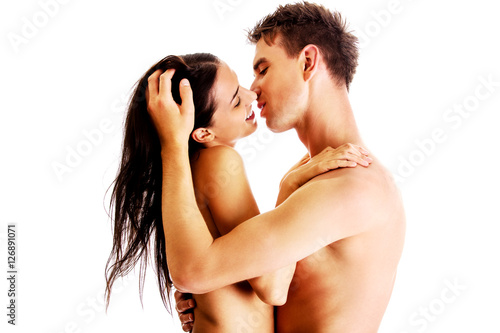 Close up of a nude couple kissing