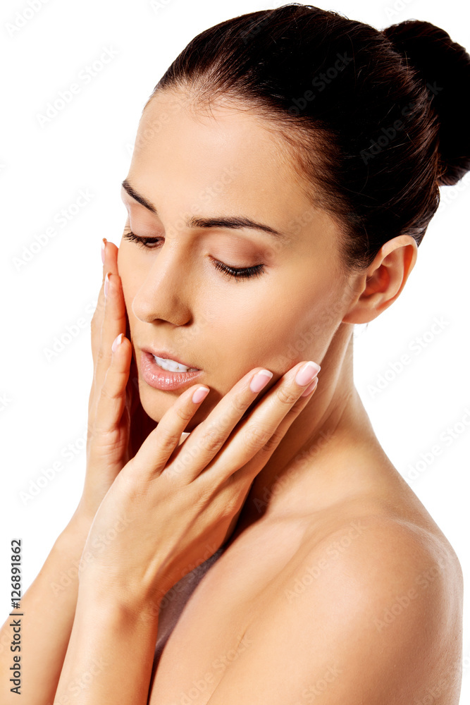 Beautiful face of young woman with clean fresh skin. Beautiful face of young woman with clean fresh skin.