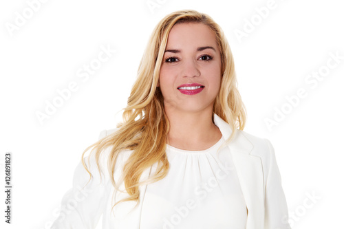 Portrait of attractive teenager girl smiling, over white.