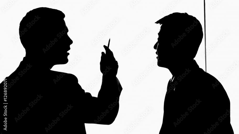 MS Silhouette of two businessmen talking and pointing to white board / China MS Silhouette of two businessmen talking and pointing to white board / China