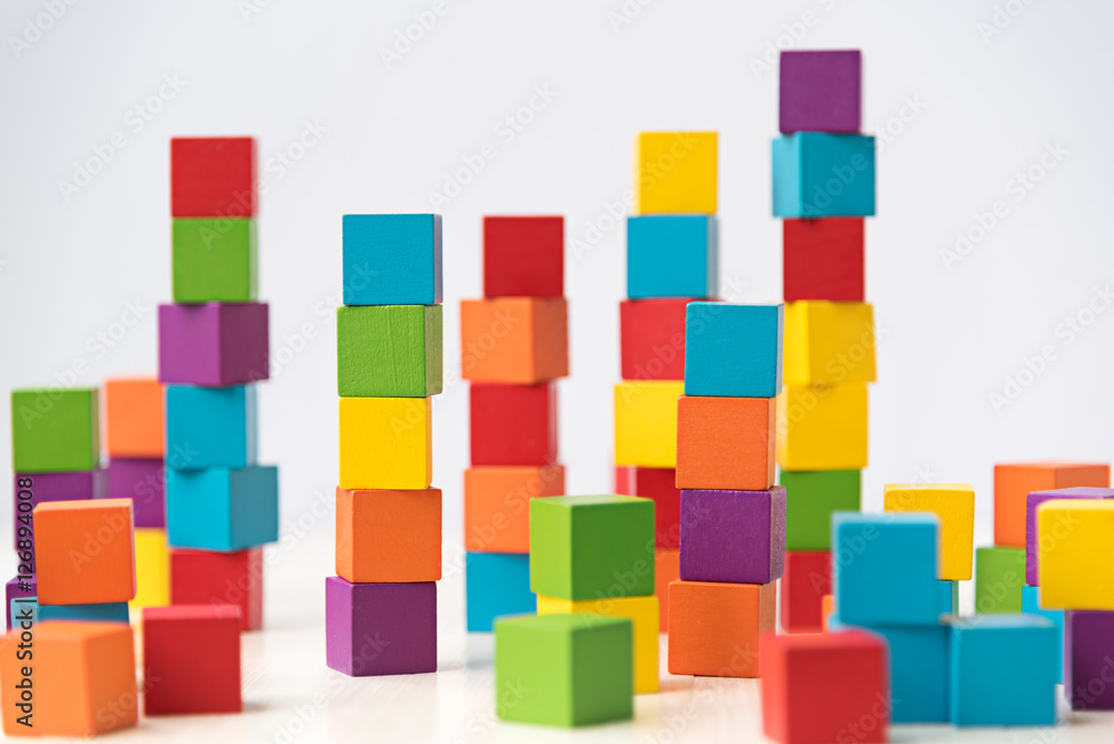 Colorful stack of wood cube building blocks Colorful stack of wood cube building blocks