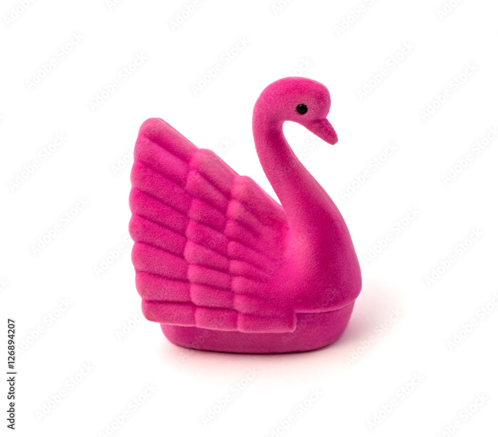 Pink statuette of swan isolated on a white background Pink statuette of swan isolated on a white background