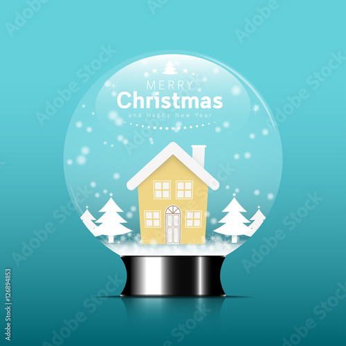 Merry christmas glass ball with house and text in snowfall.