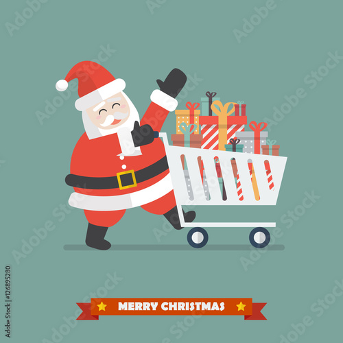 Santa claus push a shopping cart with piles of presents © siraanamwong