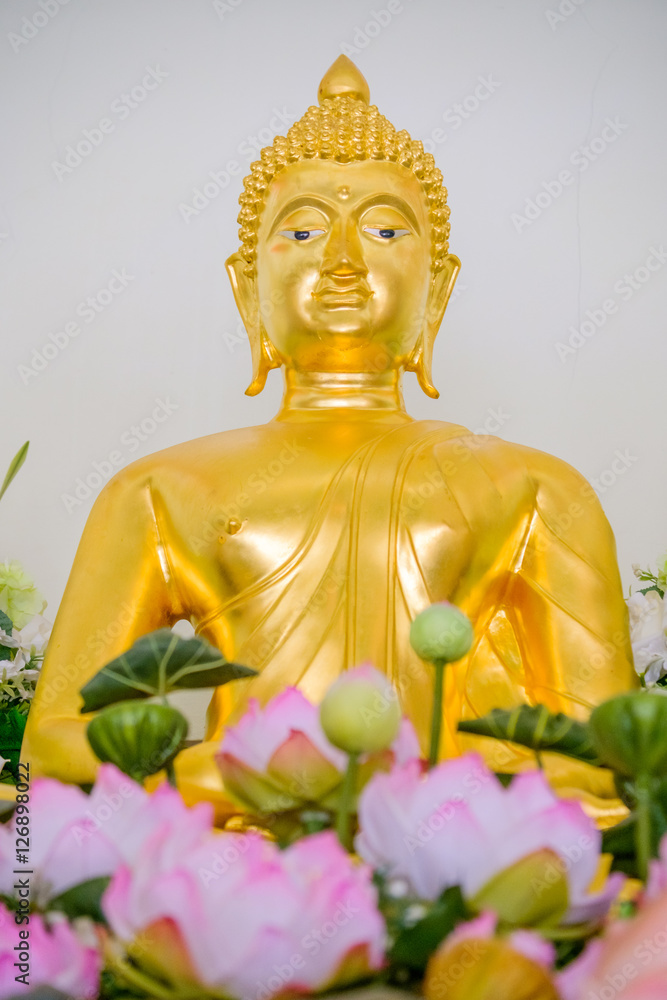  Detail of Buddha gold statues decorating the Buddhist temple  in Udon Thani ,Thailand. Photo taken on: 10 November , 2016