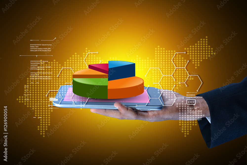 Fototapeta premium Business man showing pie chart with tablet computer in color background