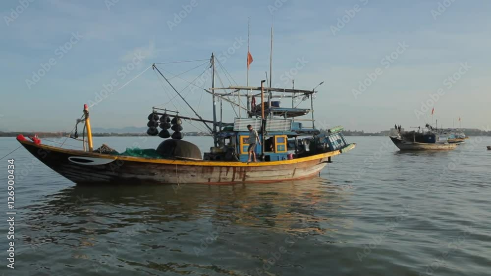 WS Man Prepping His Fishing Boat / Vietnam WS Man Prepping His Fishing Boat / Vietnam