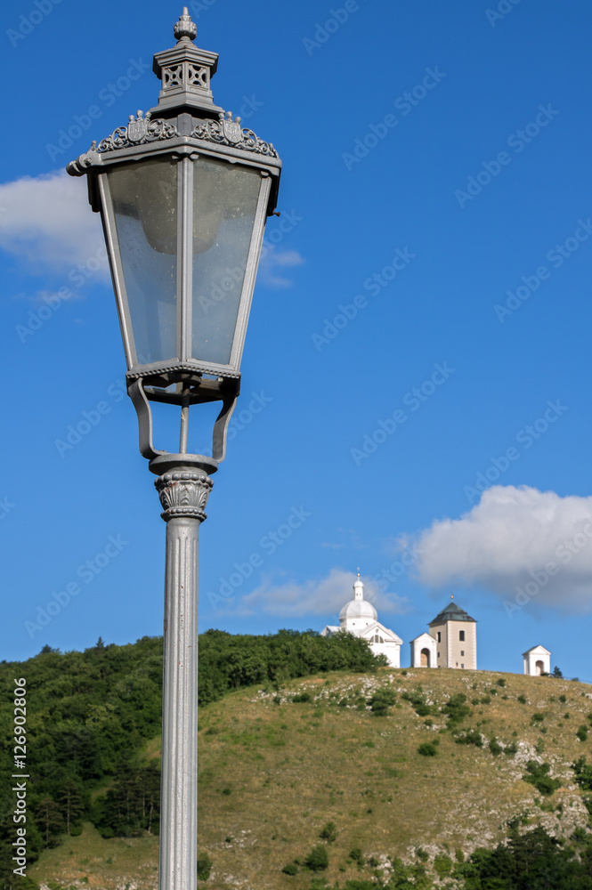 street lamp on the background of Holy Hill with chapel, Mikulov, Czech republic