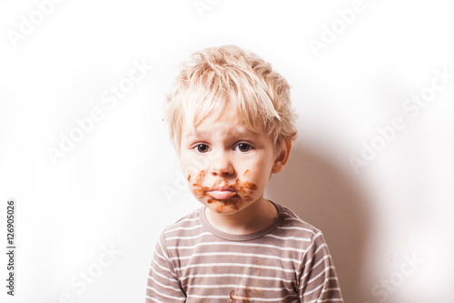 Boy eated chocolate