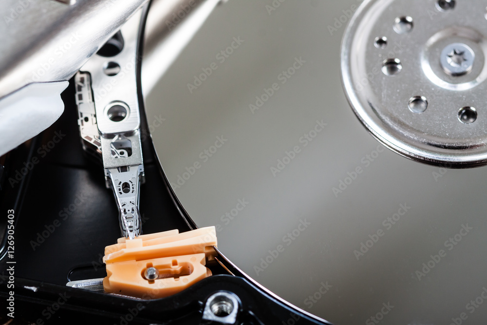 Spindle and open plate of hard disk drive. Spindle and open plate of hard disk drive.