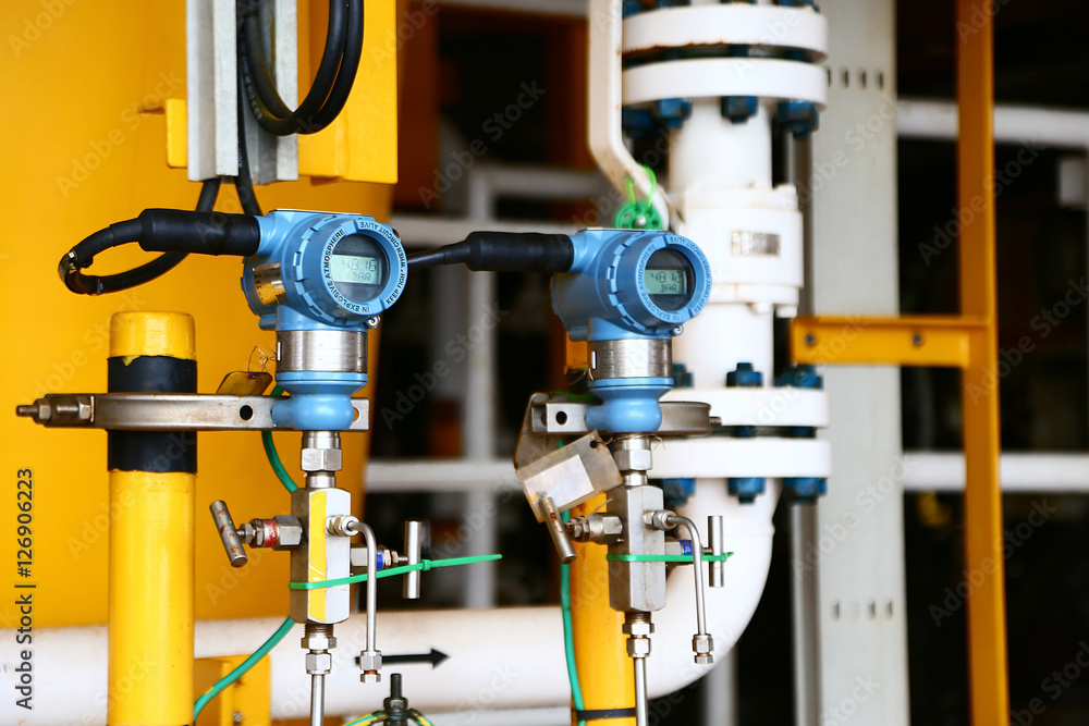 Pressure transmitter in oil and gas process, Send signal to controller and reading pressure in the system, Electronic transducer and sent data from production process to Processor Logic Controller. Pressure transmitter in oil and gas process, Send signal to controller and reading pressure in the system, Electronic transducer and sent data from production process to Processor Logic Controller.