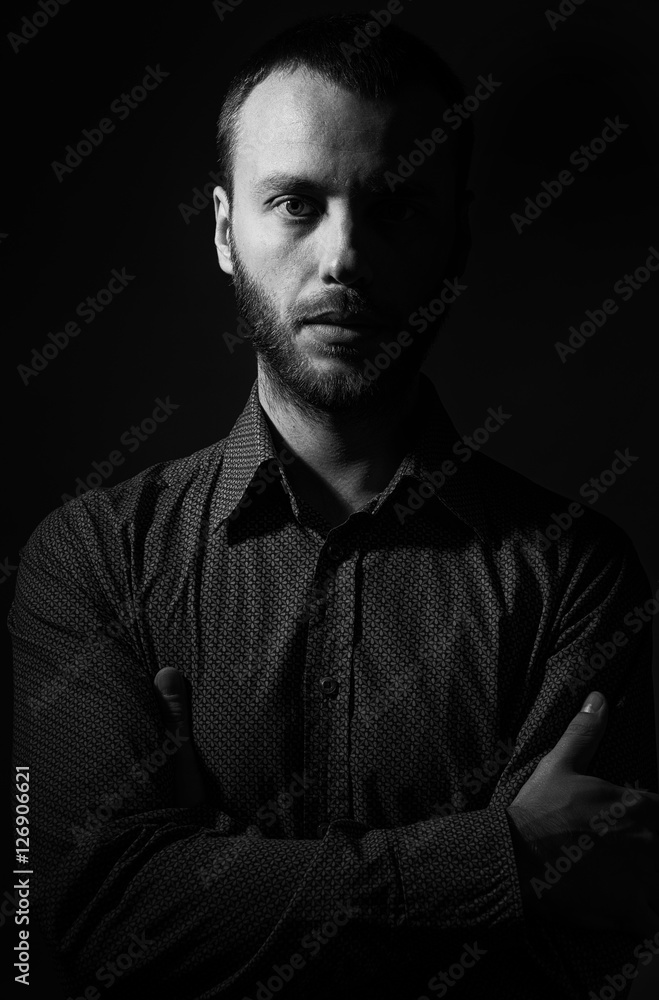Fototapeta premium handsome bearded man in the dark