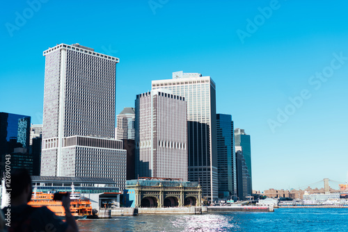 Silhouette of a traveler taking a picture of downtown Manhattan