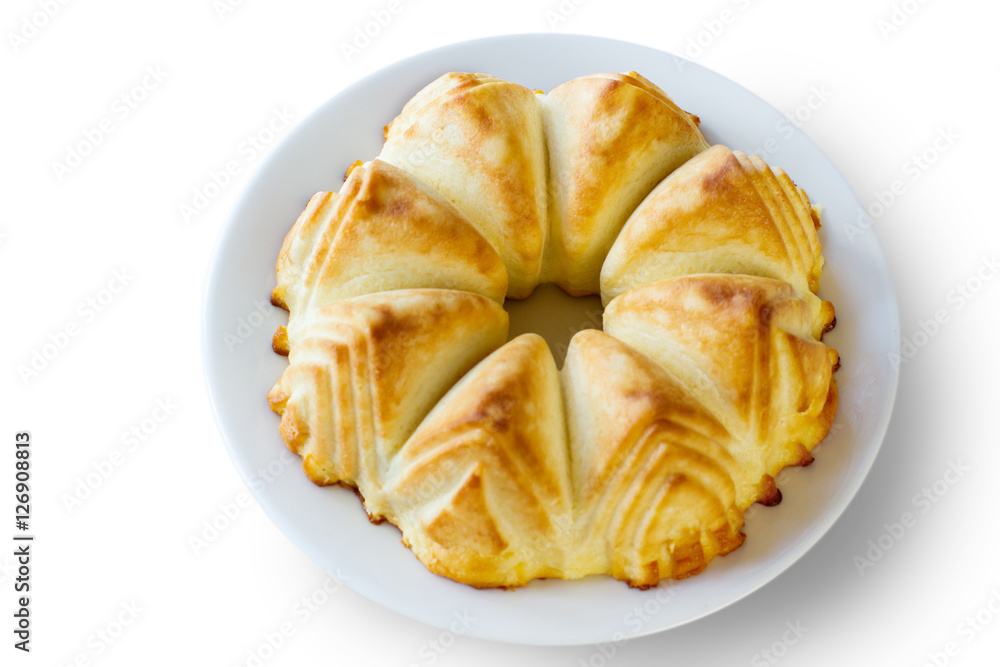 Top view of curd casserole. Baked cheesecake on plate. Dish made of sour milk. Tasty dessert on white background. Top view of curd casserole. Baked cheesecake on plate. Dish made of sour milk. Tasty dessert on white background.