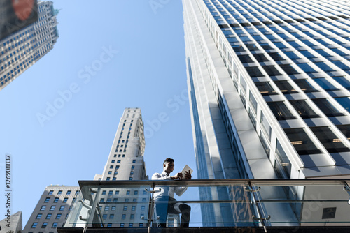 Young african businessman outside