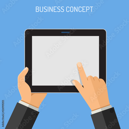 Man holding tablet PC in hand