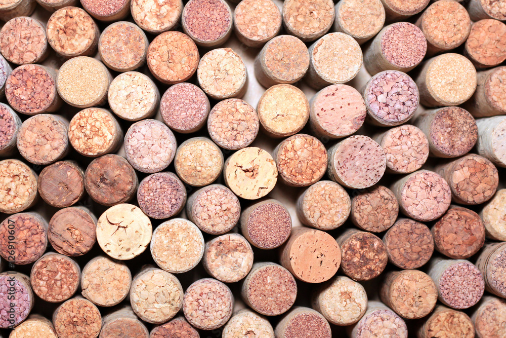 Background of used wine corks. Wall of many different wine corks