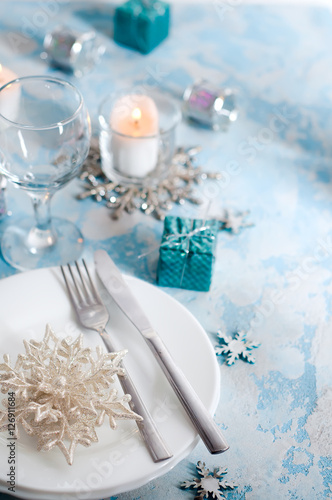 Silver and cream Christmas Table Setting with decorations