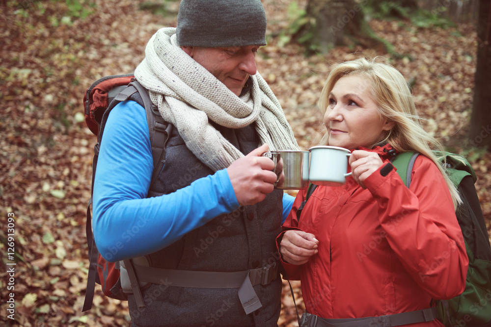Fototapeta premium Drinking hot tea to warm up