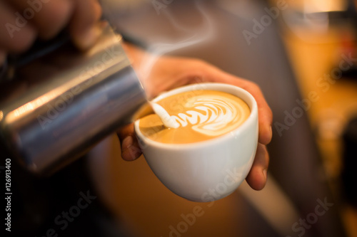 Making of cafe latte art.