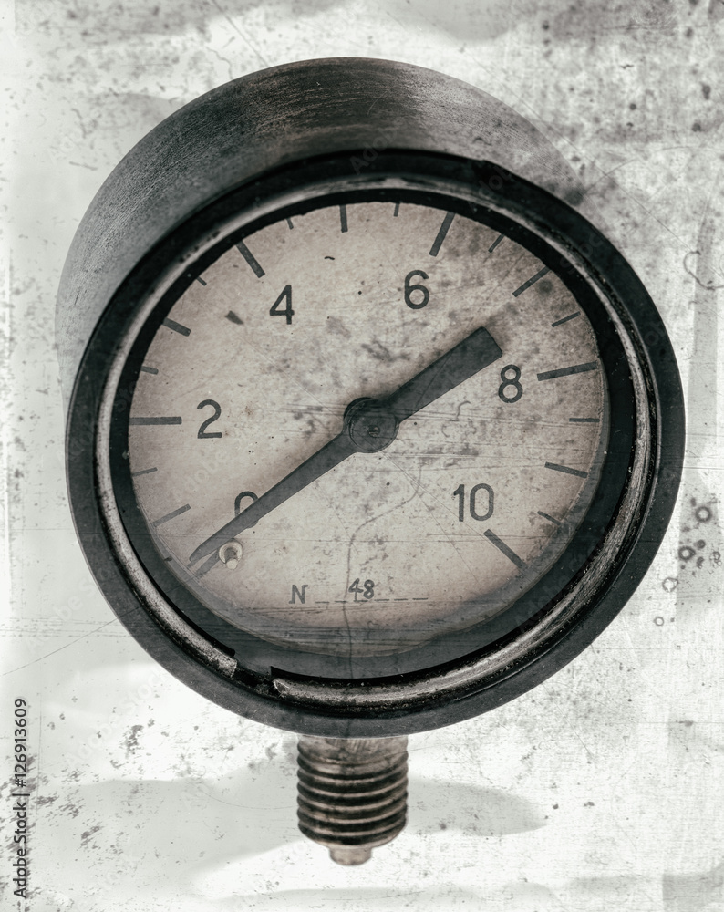 The old vintage measuring device with a scale from 0 to 10, and the