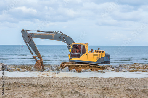 Thailand June 10.2016 excavators road repairs preparations for t