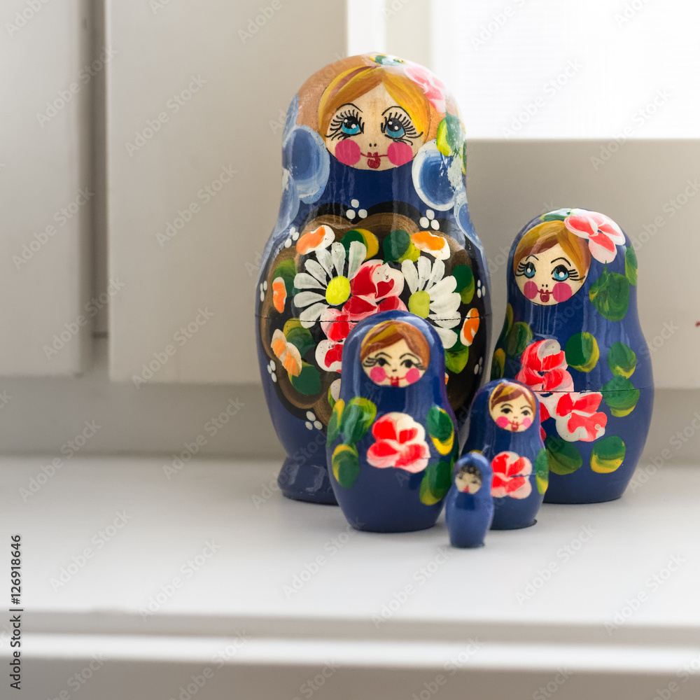 Five blue matryoshkas