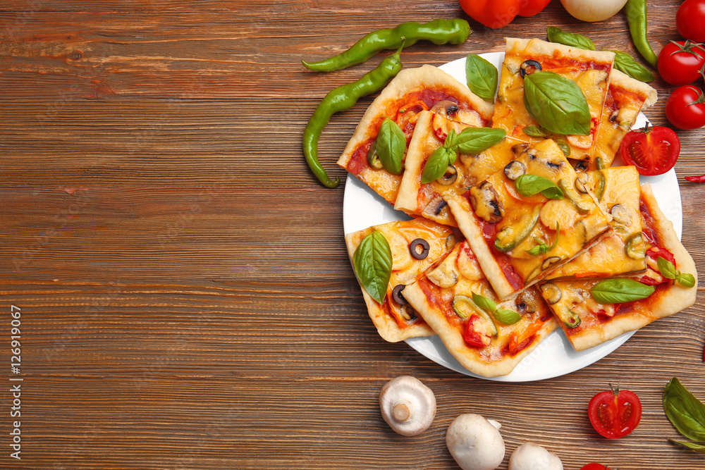 Delicious pizza slices on plate Delicious pizza slices on plate