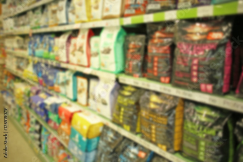 Fotografía Packs of animal food on pet shop shelves